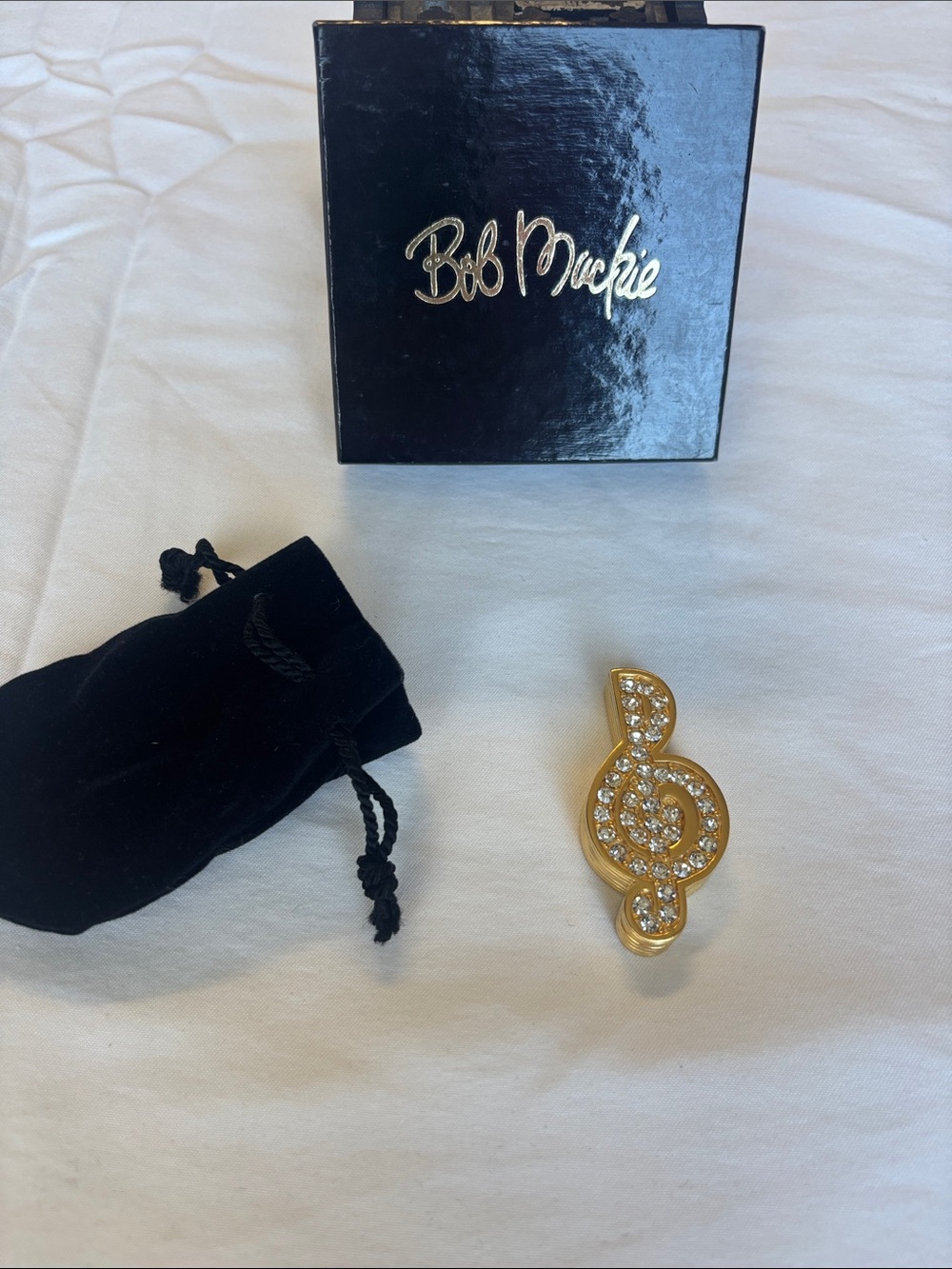 Bob Mackie Gold-Tone Treble Clef Brooch with Clear Rhinestones